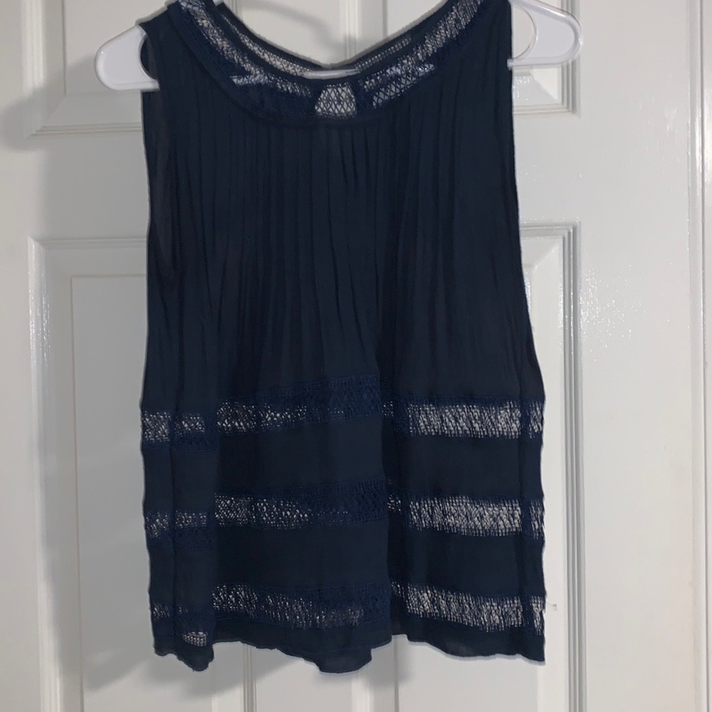 Hayden sleeveless navy blue blouse. Scoop neck with lace open detail, Small